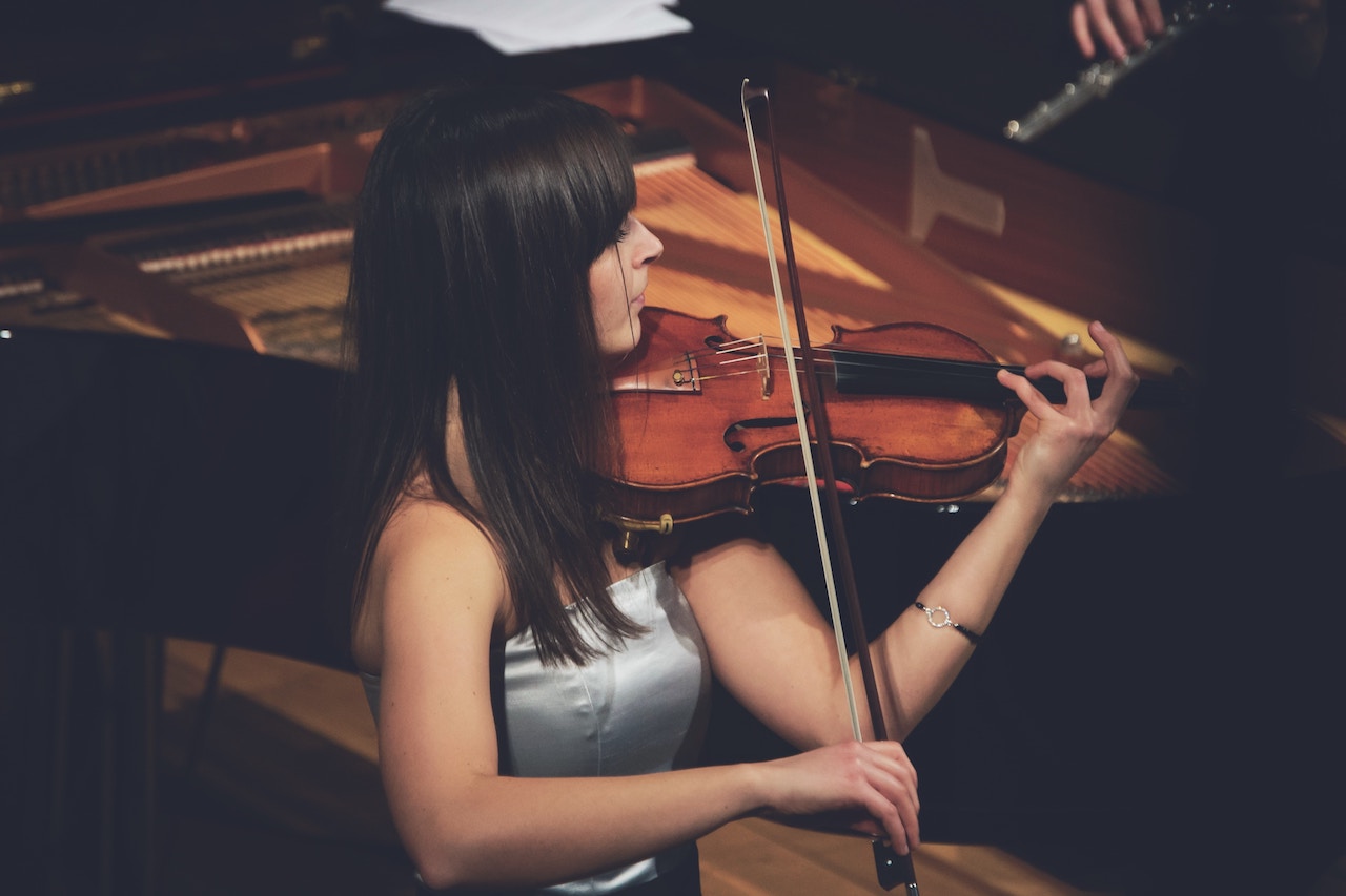 A woman playing violin